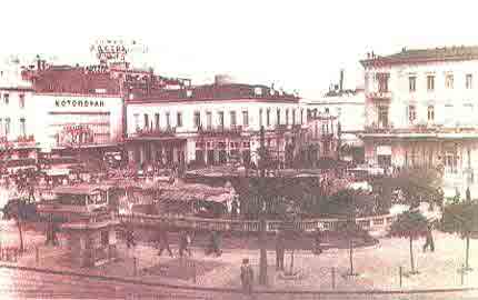 Omonias square after the Second World War. In the centre of the square there are flower shops.